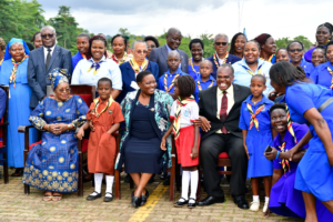 Prime Minister posing in a picture with Uganda Girl Guides