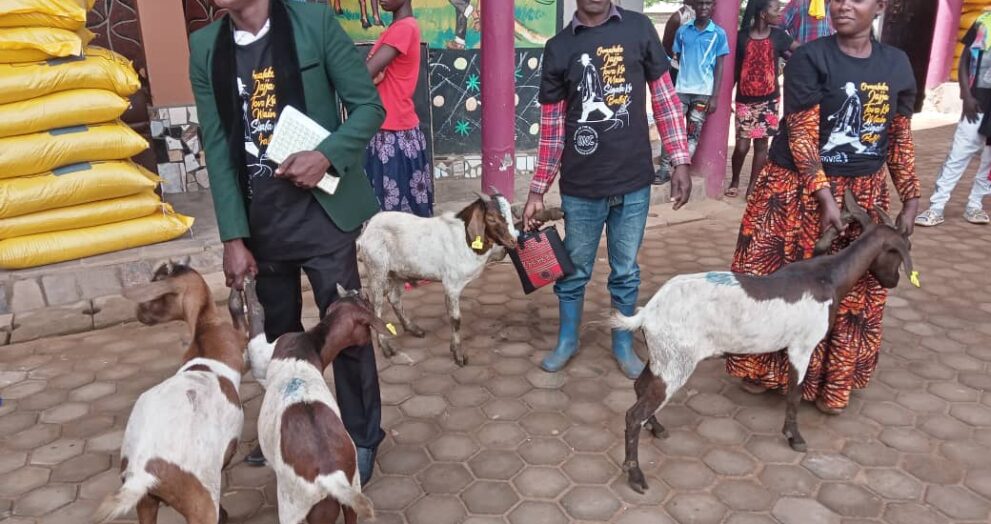 Some of the residents of Nakaseke and Nakasongola receiving superior-breed goats