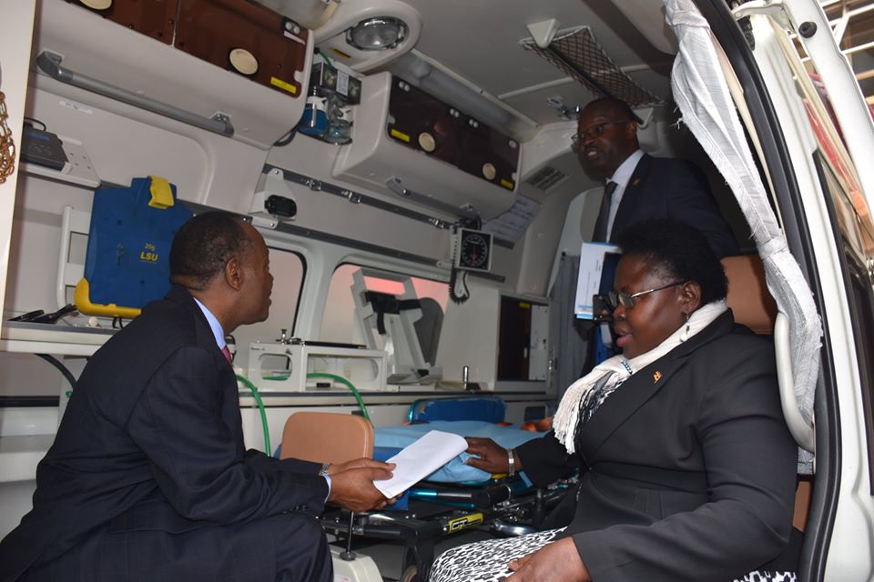 State Minister for primary Health Care Dr Joyce Moriku Kaducu checking out one of the new ambulance