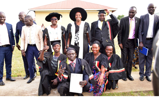 The State House Comptroller Jane Barekye poses for a photo with some of the graduates during the 1st graduation of the Presidential Initiative for Zonal Industrial Parks for Skills Development, Value Addition and Wealth creation at the Alur Zonal Industrial Hub in Alur Zonal Industrial Hub in Atenjo Village, Zombo District